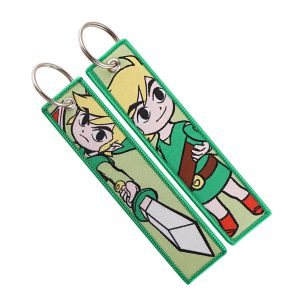 Dois chaveiros de tag verde bordada com o Link cartoon, de The Legend of Zelda, com argola