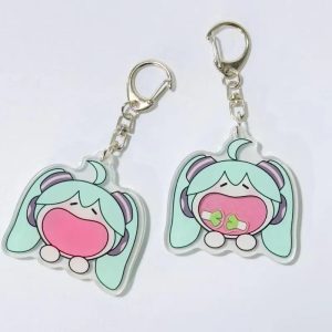 Dois chaveiros de acrílico da Hatsune Miku chibi, Vocaloid, com mosquetão de metal, em fundo claro