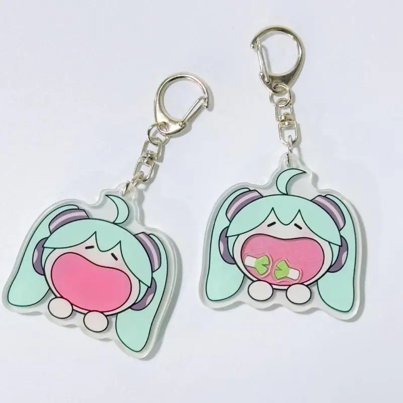 Dois chaveiros de acrílico da Hatsune Miku chibi, Vocaloid, com mosquetão de metal, em fundo claro
