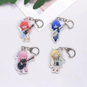 Quatro chaveiros de acrílico chibi de Bocchi the Rock!, cada integrante com sua guitarra