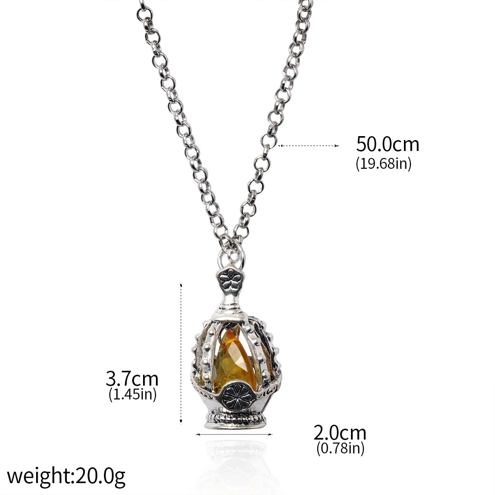 Soul gem de cristal amarelo com medidas de 3,7 x 2 cm e corrente de 50 cm
