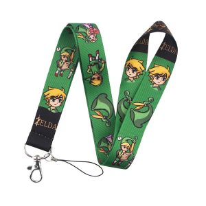 Cordão verde com o Link em desenho cartoon e o logotipo Zelda, com mosquetão