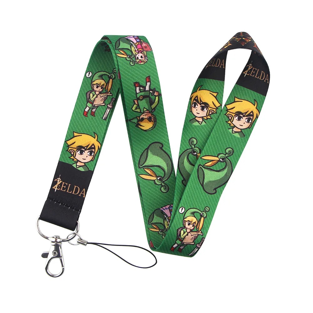 Cordão verde com o Link em desenho cartoon e o logotipo Zelda, com mosquetão