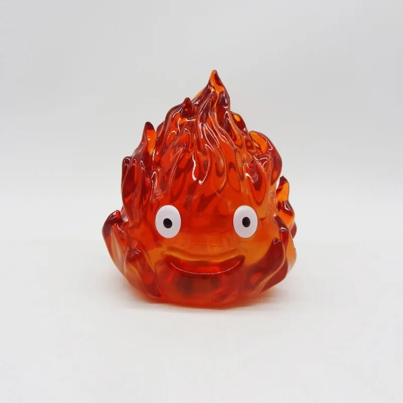 Figure do Calcifer, de O Castelo Animado, em chama translúcida laranja de olhos grandes e sorriso