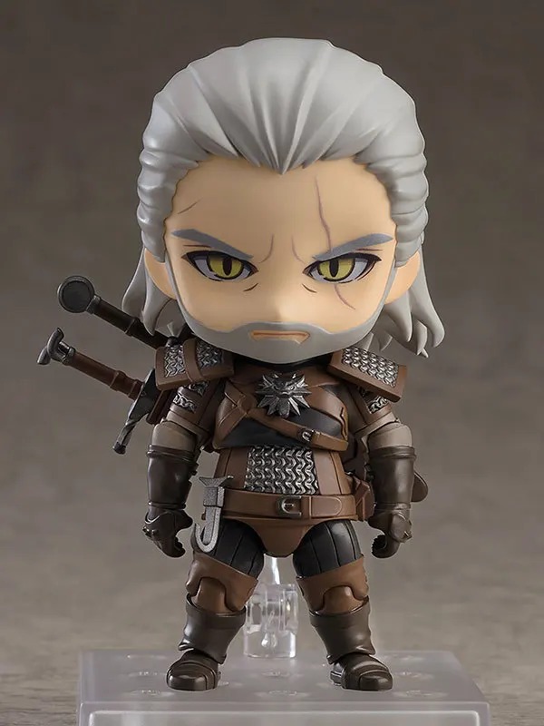 Figure chibi do Geralt de Rívia, de The Witcher, de frente, com as espadas nas costas