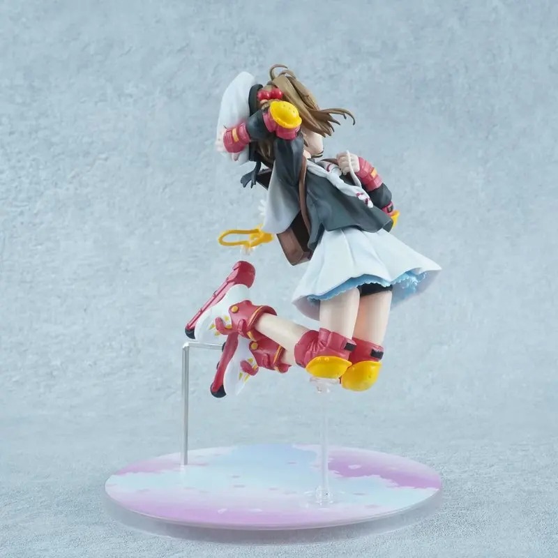 Sakura Kinomoto em pose de salto, de lado, sobre a base redonda, de Sakura Card Captors