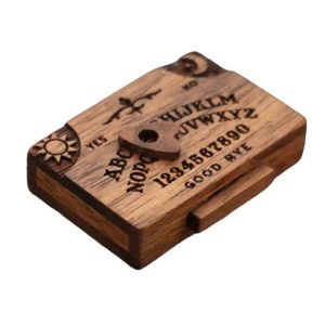 Mini tabuleiro Ouija de madeira com o ponteiro no centro, visto de cima