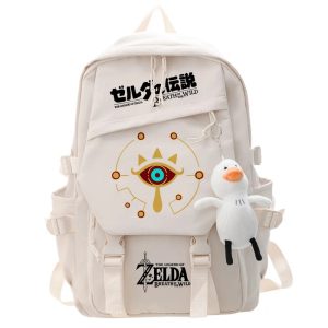 Mochila bege com Olho Sheikah, logo de Zelda e Cucco de pelúcia pendurado