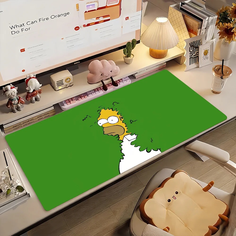 Mousepad do Homer Simpson no arbusto numa mesa decorada, de Os Simpsons