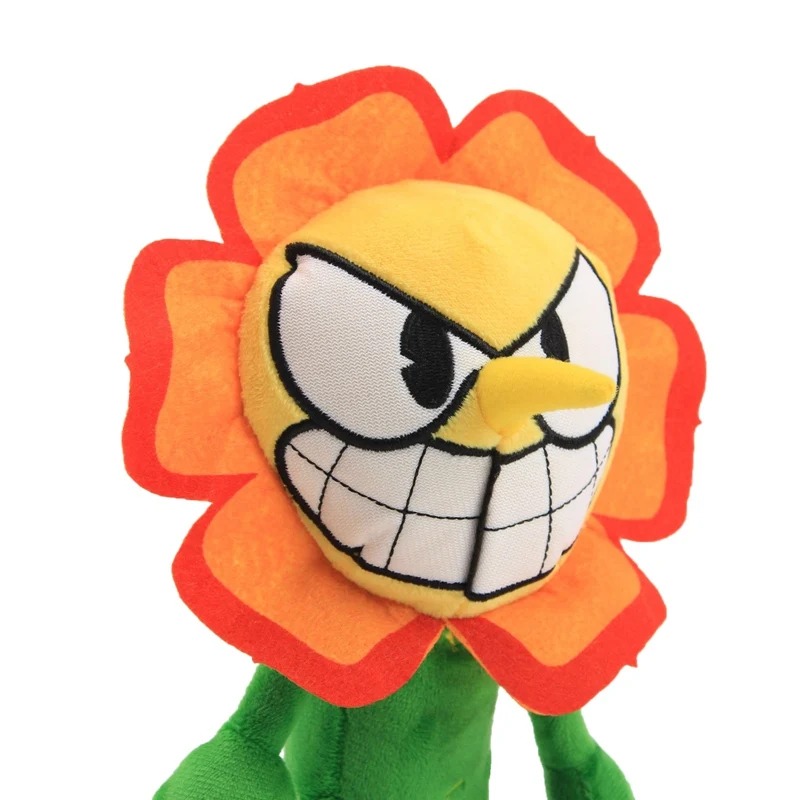 Rosto da pelúcia da Cagney Carnation em close, com o bico amarelo