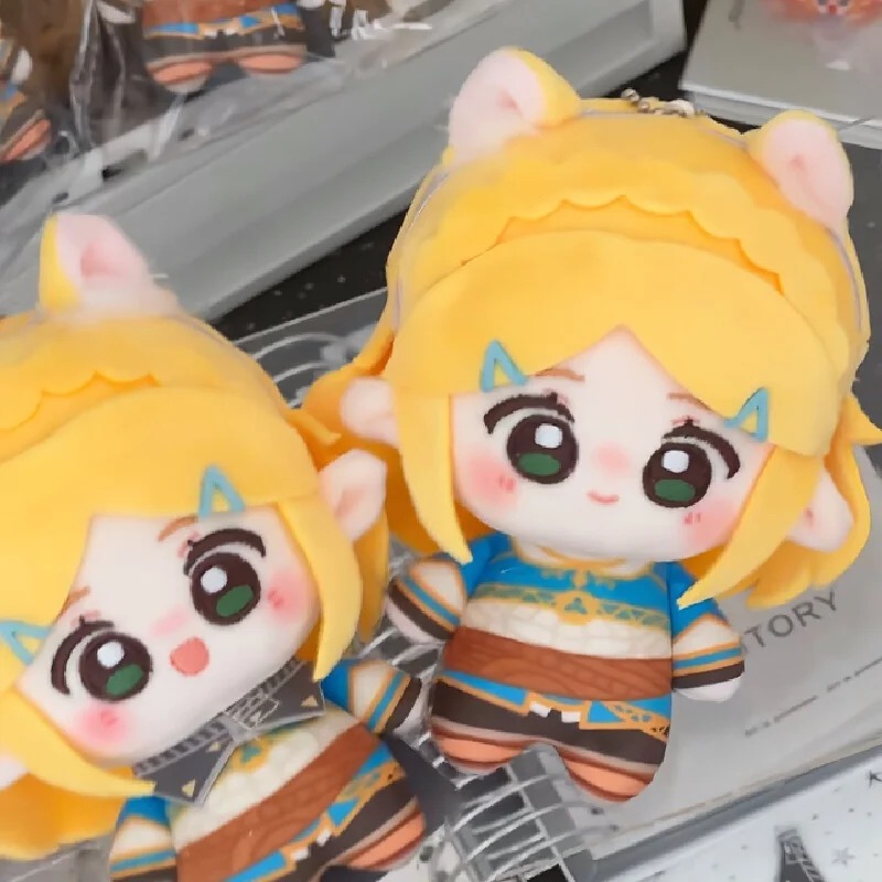 Par de pelúcias chibi da Princesa Zelda lado a lado