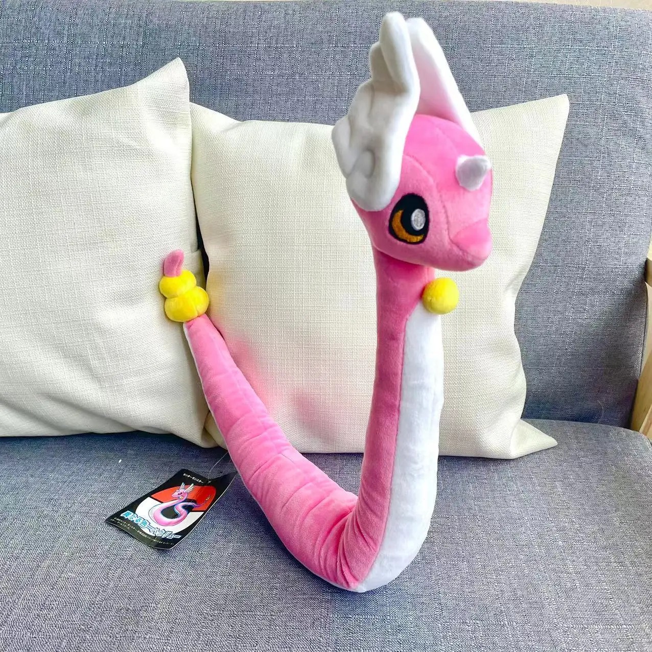 Dragonair de pelúcia, de Pokémon, com 65 a 70 cm, na cor rosa, cauda longa e esferas amarelas