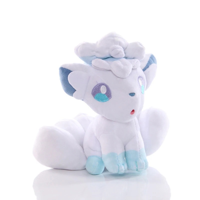 Vulpix de Alola de pelúcia, de Pokémon, branco, com detalhes azul claro nas patas