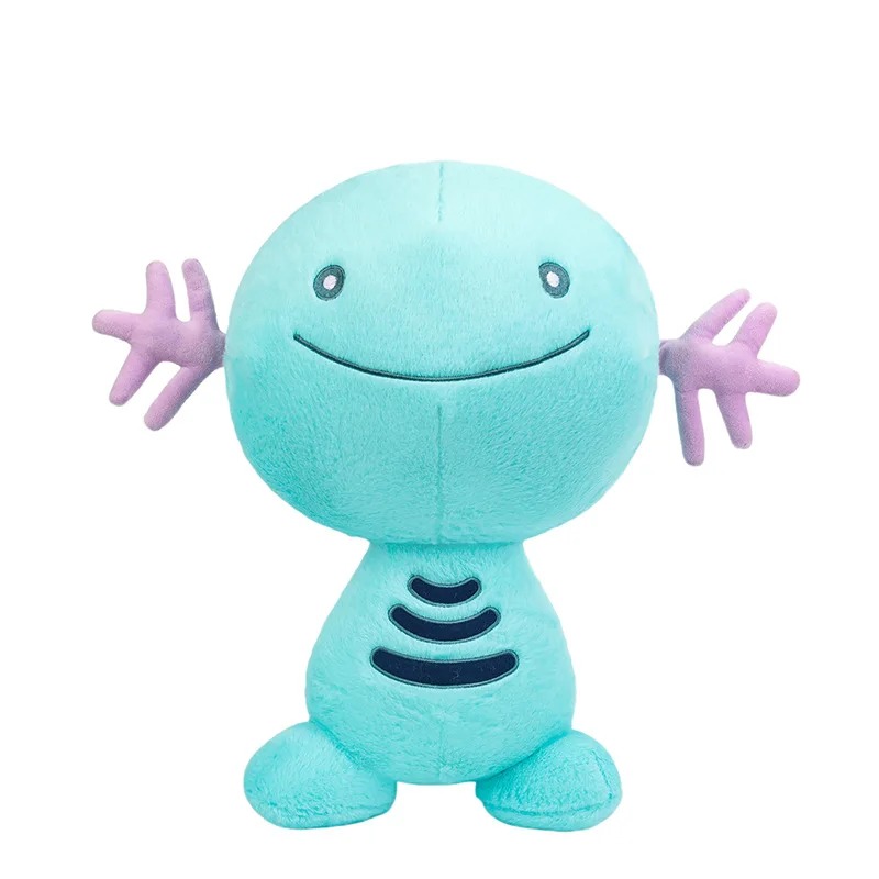 Wooper de pelúcia, de Pokémon, azul-turquesa, sorriso largo e guelras rosa, fundo branco