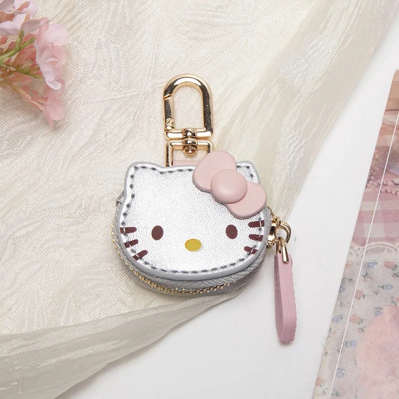 Porta-moedas prata da Hello Kitty com laço rosa, zíper e argola dourada