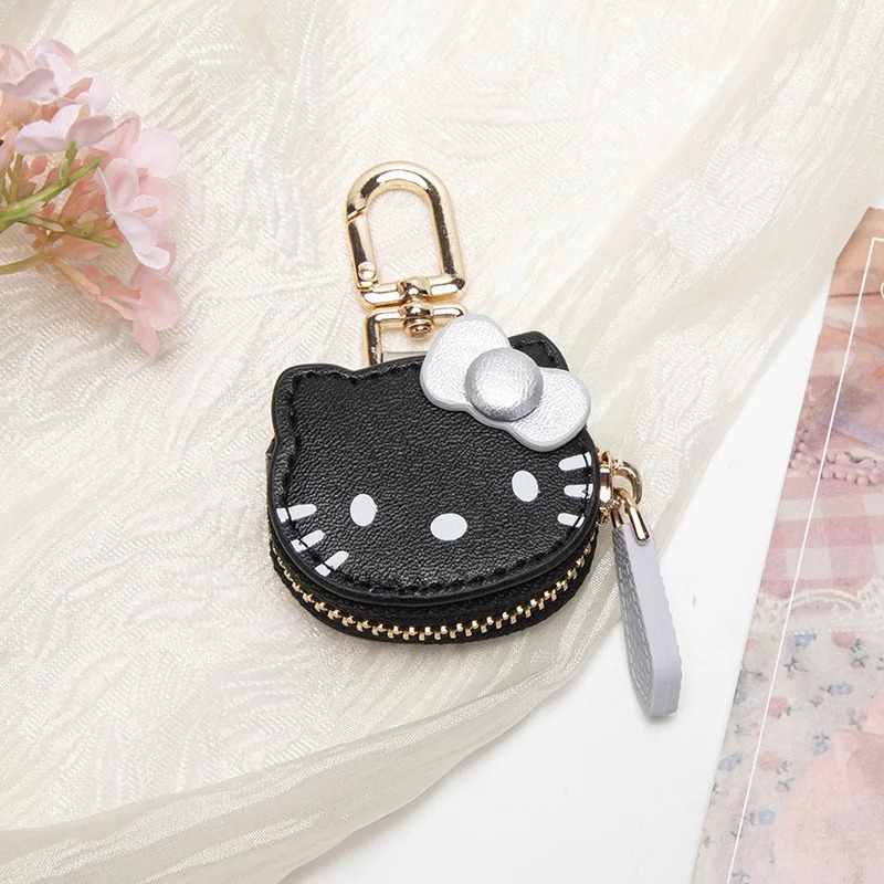 Porta-moedas preto da Hello Kitty com laço branco, zíper e argola dourada