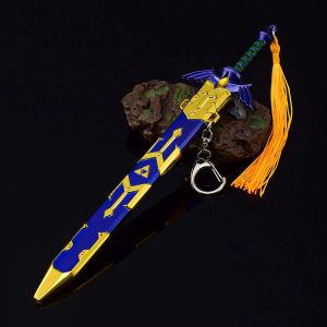 Master Sword de Zelda com bainha azul e dourada e borla laranja, sobre fundo preto